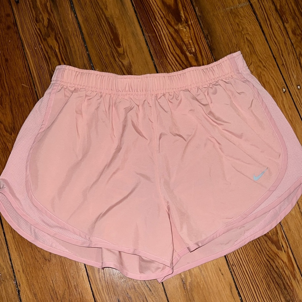 Pink Nike running shorts